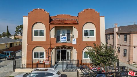 Photo of 329 W Magnolia Street, Compton, CA 90220 (MLS # 25629895)