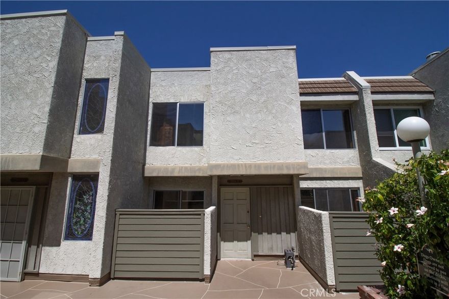 Delightful, freshly refurbished Townhouse with new carpet, paint and patio decks located in beautiful Studio Village. 1,056 square foot, 2 bedrooms 1 full bath on second floor plus powder-room on main floor. In unit full sized Stacked Washer And Dryer included. Two enclosed porches, decorative fireplace. Ample closet and storage space. Unit is nearby 1 of 6 pools and 2 tennis courts within the village complex. 2 side by side parking spaces in semi-sub secure garage. Within Carpenter Charter Elementary School boundary. Spectrum Basic Cable Service is included in rent. Pets possible, restrictions apply.