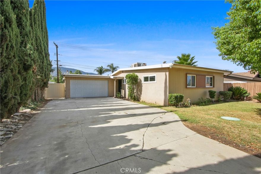 Charming 3-bedroom home located in the heart of Corona, CA! This property features fresh interior paint throughout, a beautifully updated bathroom with a new vanity and countertop, and an additional half bath for convenience. The kitchen is ready for your personal touch — make it your own and create the perfect space for cooking and entertaining.



Step outside to a large, well-maintained lot that offers plenty of room to relax or host gatherings. Enjoy summer days in the sparkling in-ground pool and take in the peaceful mountain and tree views from the backyard. The property also includes a versatile outhouse with new paint and electricity — ideal for a private home office, studio, or guest space.



This home offers comfort, character, and endless potential — all in a desirable Corona neighborhood close to shopping, parks, and schools.