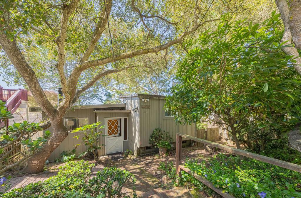Perched atop the serene hill of Pacific Grove, this charming 1-bedroom, 1-bath retreat offers a perfect blend of privacy and convenience. Surrounded by lush trees, the open-concept design seamlessly connects indoor and outdoor living, with a spacious deck and open yard ideal for relaxing or entertaining. Enjoy easy access to stunning beaches, Cannery Row, downtown Pacific Grove, and the world-renowned Pebble Beach. Whether you're strolling along the coastline or heading out for a scenic drive, this hidden gem provides the perfect coastal escape with quick access to the highway for effortless travel.