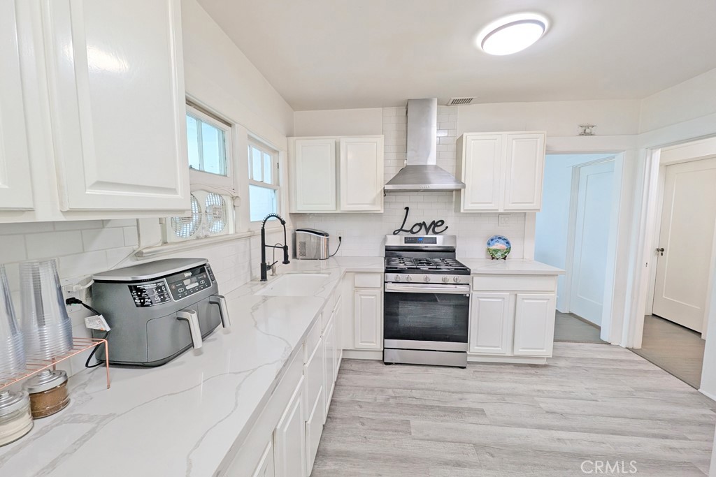 Showings Only: Saturday, Sept. 20th & Sunday, Sept. 21st - 11:15am–2:15pm!
This charming Craftsman home is located in Uptown Whittier's nationally recognized historic district! Featuring a beautifully renovated 4-bedroom + huge walk-in closet/office room, 2-bathroom main house, plus a detached converted garage (approx. 240 sq. ft.) with its own private entrance, bedroom, bathroom, and sink, this property sits on a spacious 7,002 sq. ft. lot, ideal for rental income, guest quarters, or multi-generational living, with a second entrance from the rear driveway for private and easy access.
Upgrades include a newer roof, upgraded electrical panel, and a newer patio cover connected to the converted garage. Inside, the gourmet kitchen boasts sparkling quartz countertops, new cabinets, premium appliances, and luxury LVP flooring throughout. Additional highlights include a walk-in pantry, an oversized room with a walk-in closet and office space, and spacious bedrooms. Outside, enjoy both large front and back yards with driveway access to the backyard.
Location is everything! Walk to Central Park for concerts or stroll to the lively Greenleaf Promenade, home to unique restaurants, the historic Starlight Cinema, craft breweries, and boutique shopping. With easy freeway access to both LA and Orange County, this turnkey property blends historic charm with modern luxury, making it a true gem in one of Southern California’s most desirable walkable neighborhoods.