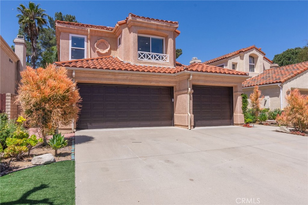Welcome to your dream home in the highly desirable Campus Hills community! This stunning 4-bedroom, 2.5-bath residence has been completely remodeled with thoughtful upgrades and high-end finishes throughout. Every detail has been carefully curated to offer both modern luxury and everyday comfort. Step into your chef’s kitchen—a true showstopper—featuring quartz countertops, custom shaker cabinets, stainless steel appliances, and a spacious farmhouse-style sink. Natural light pours in through the new low E-glass skylight, highlighting the sleek LED recessed lighting and new dual-paned windows and sliders. Elegant zebra shade window treatments and ceiling fans throughout the home provide comfort and style in every room. The primary suite is your private retreat, showcasing a remodeled spa-like bathroom with a walk-in shower, free-standing soaking tub, and designer finishes. Additional features include new flooring, a remodeled secondary bathroom, and a new roof with double underlayment installed in 2022—ensuring peace of mind for years to come. Step outside to an incredible backyard transformation, complete with high-quality artificial turf, beautifully designed landscaping, and plenty of space to relax or entertain. A spacious 3-car garage provides ample parking and storage. Enjoy the low HOA that gives you access to community amenities like a sparkling pool and spa. Perfectly situated just minutes from the 118 freeway, Moorpark College, local schools, parks, and shopping—this home checks every box. Lovingly modernized by its current owners with premium materials and exceptional craftsmanship, this home is a rare find that truly shines from every angle. Don't miss this opportunity—schedule your private showing today before it's gone!