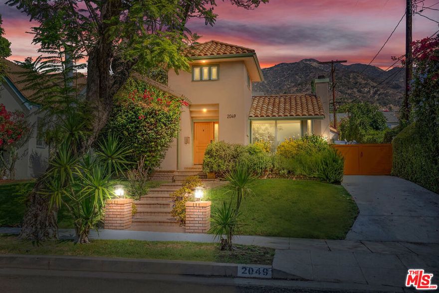 Welcome to 2049 Watson St, Glendale a beautifully renovated 3-bedroom, 2.5-bath home that blends timeless charm with modern luxury. With nearly 1,924 sq ft of living space, this gem features vaulted ceilings, maple hardwood floors, and a working fireplace that anchors the open floor plan. The gourmet kitchen shines with quartzite countertops, high-end appliances including a Viking stove and hood, and an artistic backsplash that adds a unique designer touch. Remodeled with premium finishes throughout, the home also offers a spacious family room with custom built-ins and wet bar, leading to a private patio with a built-in BBQ. All closets have been thoughtfully renovated with custom systems to maximize space and function. The detached two-car garage, equipped with an EV charger, adds flexibility for a studio, office, or creative space. Nestled on a quiet cul-de-sac near the Glendale/Burbank border, you'll enjoy a prime location close to parks, The Americana, major studios, and hip neighborhoods like Atwater Village, Los Feliz, and Eagle Rock.