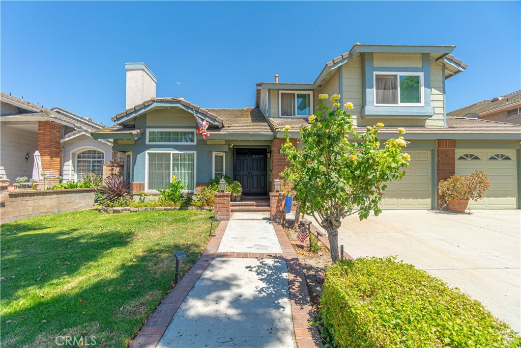 Welcome to your new home! This home has 4 bedrooms and 3 bathrooms and is within Chino School District and walking distance to highly rated Edwin Rhodes Elementary School. Walk in through the front door to a large entryway with step down formal living room with fireplace and dining room. End of entry step down into a nice size kitchen open to the family/dining room. Down the hallway from the kitchen is the laundry room and is a nice sized bedroom with a well-appointed bathroom that has a walk-in shower, is perfect place if you have your mom visiting! Backyard is landscaped with a large covered patio, great for entertaining. Now upstairs to the large master with un-suite with a soaking tub and separate shower, also two nice sized bedrooms, and another bathroom with double sinks, and last but not least a 3 Car Garage to keep all your Toys.