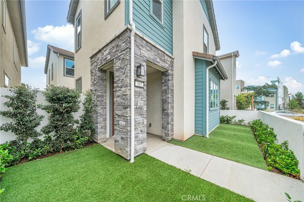 Photo of 302 Merit, Irvine, CA 92618 (MLS # OC25226179)