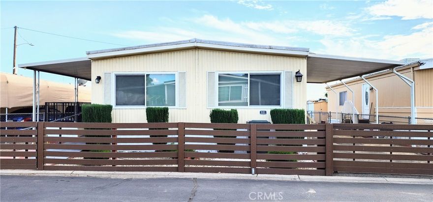 Turnkey Beauty in Crestmore Mobile Home Park!!. 

Discover this beautifully upgraded 2-bedroom, 2-bathroom home—stylish, comfortable, and completely move-in ready! The open-concept kitchen is the heart of the home, featuring a large island, designer cabinetry, granite countertops, and a deep sink—perfect for both cooking and entertaining. Additional upgrades include laminate flooring throughout, energy-efficient double-pane windows, elegant designer blinds, and convenient in-home stackable washer & dryer, Newer A/C.



Designed with accessibility in mind ADA compliance, this property offers a wheelchair-accessible ramp, wide doorways, and an upgraded bathroom for easy mobility. Step outside to enjoy the welcoming front porch, soak in the beautiful views of Mount Rubidoux, relax in your private, fully fenced backyard, and take advantage of the extra storage shed. The covered carport fits up to 3 small cars!



At Crestmore, you’ll enjoy amenities including a sparkling pool, soothing jacuzzi, and a recreation room available for your private gatherings and celebrations.



This gem truly has it all—modern upgrades, comfort, and a welcoming community. Don’t wait—schedule your showing today before it’s gone!