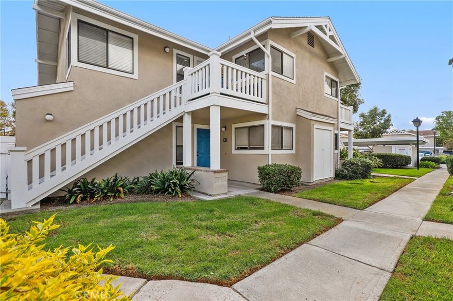 Tucked into a quiet, private corner of the community, this beautifully upgraded 2-bedroom, 2-bathroom upper end unit offers comfort, style, and convenience in equal measure. From the moment you step inside, you’re welcomed into a light-filled living space that radiates warmth and ease. Gleaming laminate flooring flows throughout the hallway, living room, and dining area, creating a seamless and modern aesthetic. The open-concept layout leads you into a charming dining space and a thoughtfully updated kitchen featuring elegant Quartz countertops, stainless steel appliances, and sleek cabinetry — perfect for preparing everything from your morning coffee to evening dinners with friends. Both bedrooms are adorned with matching laminate flooring, offering a clean and cohesive feel. The guest bedroom sits just off the hall near a full bathroom, while the spacious primary suite — tucked privately at the end of the corridor — includes its own en-suite bath with a walk-in shower and direct access to a serene private balcony. Additional features include a cozy patio at the entry, in-unit washer and dryer, included refrigerator, air conditioning, and a private storage closet downstairs. Two covered carport spaces are also included for your convenience. Enjoy the best of both worlds — a peaceful residential vibe just a short walk to Irvine Valley College, Walnut Creek Golf Course, parks, and more. This pet-friendly home is the ideal retreat for those seeking low-maintenance luxury in a prime Irvine location.