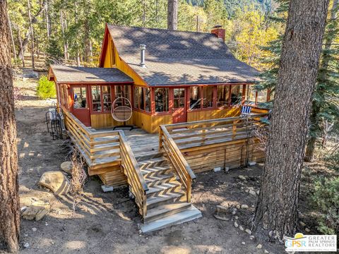 Photo of 25250 Rim Rock Road, Idyllwild, CA 92549 (MLS # 25625955PS)