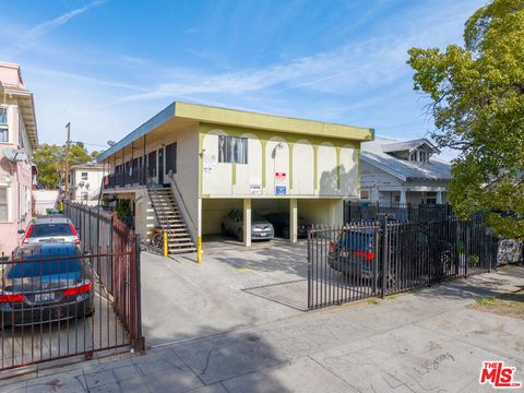 Photo of 869 W 41st Street, Los Angeles, CA 90037 (MLS # 25622777)