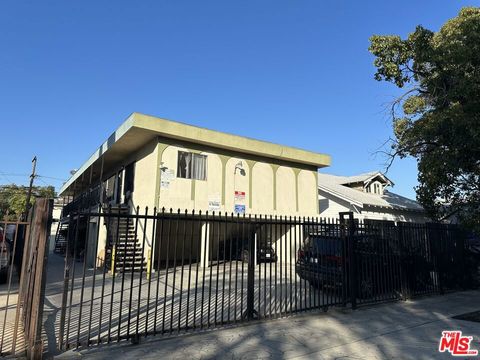 Photo of 869 W 41st Street, Los Angeles, CA 90037 (MLS # 25622777)