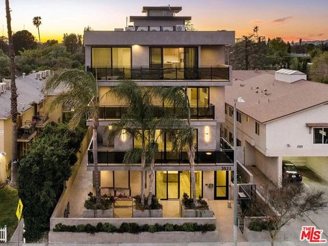 Photo of 5923 Laurel Canyon Boulevard, Valley Village, CA 91607 (MLS # 25582809)