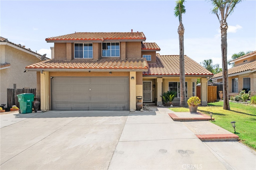 Welcome to this charming 3-bedroom, 2-bath home ideally located near McKinley and Promenade. Step inside to a formal living and dining area at the entry, perfect for entertaining. The inviting family room features a cozy fireplace and opens to the kitchen, which boasts granite counters, a stylish tile backsplash, and ample cabinetry. The windows are adorned with elegant plantation shutters, adding both beauty and privacy.
A convenient downstairs bathroom is ideal for guests. Upstairs, the spacious primary suite offers sliding doors that lead to a large private balcony overlooking the backyard. The primary bathroom includes dual sinks with granite counters and a beautifully tiled shower. Two additional bedrooms complete the second floor.
Enjoy easy-care outdoor living with artificial turf in the backyard, creating a perfect space for relaxation or play. Last but not least, an EV charger in the garage is ideal for electric cars and additional savings.