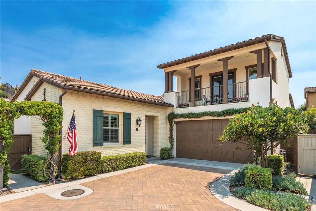 Highly upgraded and energy-efficient, this stunning Adobe Ranch-style home in the 55+ Avocet community of Esencia features owned solar panels, EV charger and large professionally landscaped backyard with private putting green! Located in one of Rancho Mission Viejo’s most desirable neighborhoods, this thoughtfully designed Plan 3 lives like a single-level home, with three bedrooms and two full bathrooms on the main floor—including a versatile bedroom currently used as an office. Upstairs, a spacious bonus room with a half bath and a covered deck overlooks scenic canyon views, offering the perfect space for guests, hobbies, or possible 4th bedroom. The open-concept kitchen is a chef’s dream, with Bianco Antico granite countertops, Whirlpool stainless steel appliances, KitchenAid cooktop, subway tile backsplash, and crisp white Thermafoil cabinetry. The main-floor primary suite is a spa-like retreat with dual vanities, a soaking tub, large walk-in shower with dual shower heads plus a rain shower, and large walk-in closet. Designer upgrades include hardwood floors, Berber carpet, upgraded tile, motorized shades, plantation shutters, recessed lighting, shaker cabinetry with under-cabinet lighting and glass doors, and a custom built-in media wall. The professionally landscaped backyard is an entertainer’s paradise featuring a covered California Ranch Room with outdoor gas fireplace, a built-in BBQ island, custom lighting, drip irrigation, and a three-hole putting green designed by a professional greenskeeper—complete with chipping mat. Stroll on the stabilized decomposed granite path by a dwarf lemon tree to space for an herb garden. Additional highlights: EV charger, whole-house water softener, tankless water heater, epoxy garage floor with built-in cabinetry, and full-home internet wiring. Over $96,000 in original builder upgrades plus many thousands more in backyard enhancements and solar installation make this home truly turnkey! Enjoy exclusive access to The Outlook clubhouse with pool, spa, and cabanas, plus all the award-winning all ages RMV amenities—clubhouses, saltwater pools, fitness centers, yoga studios, fire pits, bocce/pickleball courts, hiking trails, a neighborhood farm, and more. All this just 8 miles from the beaches of South Orange County and minutes to downtown San Juan Capistrano’s shops and restaurants.