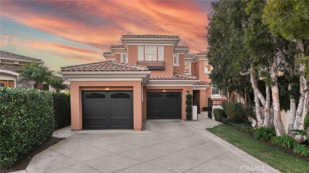Set on a uniquely private lot and positioned to maximize direct views of the Pacific Ocean, 16 Coral Reef provides a rare opportunity to reside in Pelican Ridge Estates amongst the prestigious custom homes in Newport Coast. Boasting approximately 3400 sqft of living space and three spacious bedrooms across multiple levels, this open concept floor plan offers dedicated spaces for guests while maintaining an open- concept floor plan ideal for large scale celebrations and casual living alike. The gourmet chef’s kitchen, with newly updated cabinetry, quartz countertops, and designer lighting provides the perfect focal point to entertain, while the serene backdrop of the Pacific Ocean teases the sky with ever-changing hues of the California skies and water. Upstairs, the expansive master suite, which features the best ocean views on property, provides a hotel-like ambiance that rivals the World Class Pelican Hill Resort just across the way. His and her closets, dual vanities, and designer lighting fixtures highlight the functionality & aesthetic the home provides at the highest level. Downstairs, two dedicated bedrooms + a bonus area provide a distinctly private living space supplementing the main living areas - creating a perfect setting for guests or fellow residents desiring privacy on par with larger, custom homes. Three sets of sliding doors allow one to easily traverse into the oversized outdoor space, complete with a BBQ island with seating, space for sunbathing, and the utmost privacy expected in a community of this caliber. World class community amenities, such as two 24 hour guard gates, community pools, and tennis/ basketball courts, perfectly complement the prestige and ease of living behind the exclusive Pelican Ridge gates.