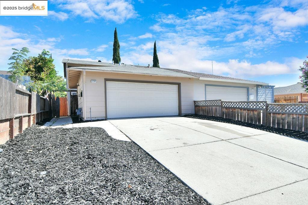 4 Bedroom, 2.5 Updated Baths 1487 sf. Remodeled, 2 car garage. Fireplace in Living Room. Updated Kitchen. 1 Bed and 1/2 Bath Downstairs. Nice rear yard with shed.
