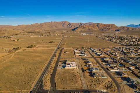 Photo of 706 Outer Hwy 18 S, Apple Valley, CA 92307 (MLS # HD26045937)