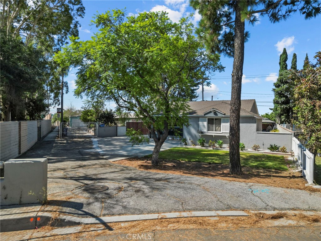 Welcome to this charming, cozy Whittier home, full of natural light and thoughtful updates. Recently painted inside and out, the home feels fresh and inviting, with durable vinyl flooring throughout. The bathroom has been upgraded with new countertops, and the master bedroom offers a small walk-in closet for added luxury. A dedicated laundry room adds everyday convenience, which also accesses the back yard. Set in a neighborhood leading to only two cul-de-sac, there is very little traffic, making the property truly shine. The large, fenced backyard provides endless possibilities for entertaining, play, or possibly an ADU or pool addition. The backyard also has direct access to a local park through a pathway behind the home. An oversized driveway provides plenty of parking where numerous cars or an RV may fit, and an EV charger already installed. This location blends convenience with community and is very freeway-friendly for commuters. The property is also close to The Quad at Whittier, Rodeo 72, schools, and other shopping centers. Outdoor enthusiasts will love the nearby parks and the Whittier Greenway Trail. With its inviting feel, spacious yard, and excellent location, this home offers both comfort and lifestyle for its next owners.