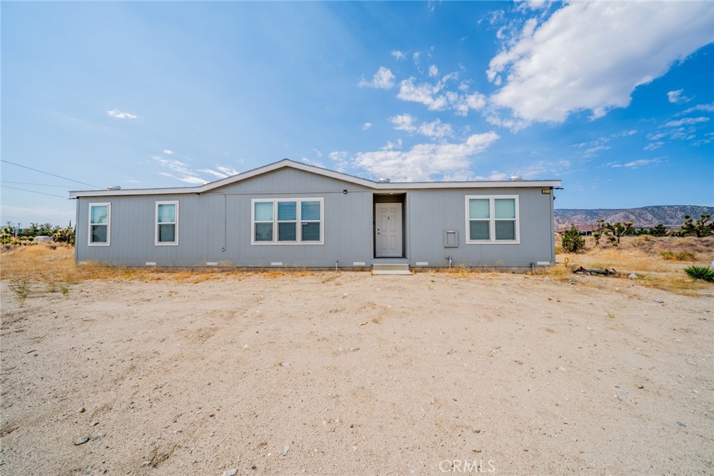 Welcome to beautiful Pinon Hills! Built in 2022 this Manufactured home on a permanent foundation has never been lived in. This 1,547 sqft house has laminate throughout and carpet on the bedrooms. Kitchen was upgraded with quartz counter tops, extra cabinets and new sink. All the windows are dual pane and have their own shutters. Large porch in the back of the house perfect for those summer gatherings.
Don't miss on this opportunity!!