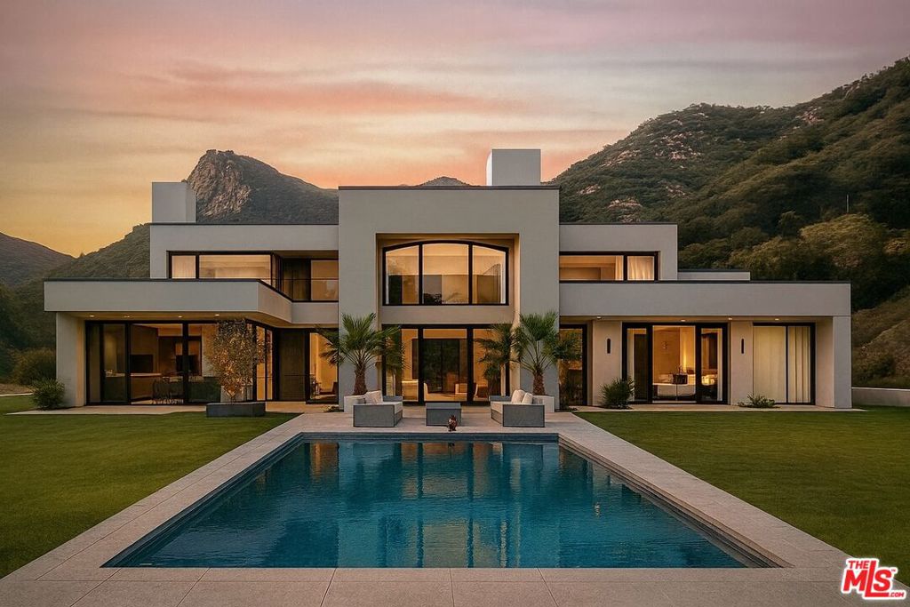 A rare opportunity to create your dream estate on 9.8 acres, utilizing the expedited Woolsey Fire permit process. Approved zoning conformance and architectural plans are already in place for a 5,416 sq. ft. residence with a 3-car garage. The expansive grounds offer ample space for a pool, spa, guest house, tennis court, or equestrian facilities including barns, arena, and accommodations for horses or farm animals. Significant infrastructure is already complete, including a paved driveway with creek crossing, water and water tank, electricity, telephone, propane, septic system, grading, drainage, and retaining walls. Nestled in the Santa Monica Mountains, within Agoura and Malibu's celebrated wine country, the property is surrounded by sycamore trees, scenic hiking trails, and seasonal waterfalls. Panoramic vistas stretch from rolling hilltops to dramatic mountain peaks, while Malibu's beaches and the 101 freeway are just minutes awayoffering the perfect balance of seclusion and convenience.