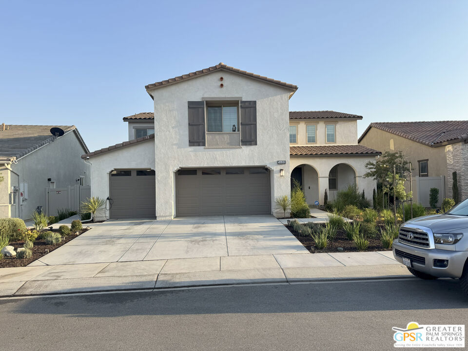 Welcome to your dream home! This stunning 5-bedroom, 3-bath residence, built in 2022, offers 3,293 sqft of modern living on a spacious 7,056 sqft lot. With over $100,000 in premium upgrades throughout the interior and backyard, this home is truly move-in ready and designed for both comfort and style.Step inside to discover upgraded stair railings with kickboards, designer light fixtures, and beautiful flooring that flows seamlessly throughout the open floor plan. The gourmet kitchen features upgraded cabinets and top-of-the-line appliances, perfect for any home chef. Throughout the home, you'll find custom real wood shutters valued at $10,000, adding both elegance and energy efficiency to every room. The versatile den with double doors is perfect for a home office or an extra bedroom to suit your needs.Upstairs, the expansive loft is equipped with upgraded ceiling speakers, creating the ultimate movie theater experience for family nights or entertaining guests. The 3-car garage boasts durable epoxy flooring and includes an electric car charging port, providing both style and modern convenience.Enjoy outdoor living year-round under the brand-new patio cover, which comes with a lifetime warranty and is engineered to support solar panels for future energy expansion. The professionally designed backyard is a true oasis, featuring a tranquil water fountain and a large storage unit included with the sale. The home is also equipped with rain gutters for added protection and peace of mind. Beyond your front door, the community offers an exceptional lifestyle with scenic walking trails, some featuring a picturesque river walk that leads to peaceful ponds. Residents also enjoy access to four community pools, each with BBQ grills, perfect for relaxing weekends and entertaining friends and family. Don't miss your chance to own this meticulously upgraded home that blends luxury, convenience, and thoughtful design in a vibrant community. Schedule your private tour today and experience all this exceptional property has to offer!