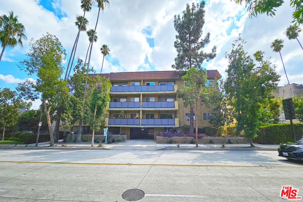 Located in Pasadena's idyllic and walkable Madison Heights, this stunning condo, situated in the back of the building and away from California Street, is perfect for those who appreciate the finest craftsmanship, top-quality materials, and elegant simplicity. Stepping inside, you enter a world of sumptuous finishes and abundant natural light. Clearly, this is not your average condo! Gorgeous red oak? hardwood flooring and intricate wood trim speak volumes about the home's quality. The floor plan is open and inviting, with the large living room flowing gracefully into the dining area. Here, a huge wall of windows looks out to the sun-soaked courtyard, which you can easily access through a sliding door. When evening comes and you prefer to have total privacy, simply flip the plantation shutters and unwind in your peaceful sanctuary! Off the dining room, a beautifully updated kitchen boasts custom wood cabinetry, gleaming granite countertops and flooring, and stainless-steel appliances. To the right of the entry, find two bright and spacious bedrooms with stunning bathrooms boasting oversized vanities and exquisite stonework the likes of which you would find in a Four Seasons suite. Don't miss your chance at this exceptional home!