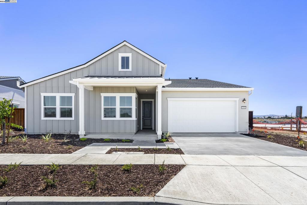 A three bedroom single story home with high ceilings in the main living areas. The third bedroom can be converted to a den. Amazing views, 12-foot ceilings, and no stairs in site – The Cobalt floorplan welcomes you home. Stepping in from the covered front porch you are greeted by views of the water. The open concept great room and dining room flow into the outdoor living space with optional sliding glass doors. The gourmet kitchen is perfect for entertaining intimate parties or family gatherings with its in-island sink and dishwasher. A large laundry room is tucked behind it just off the two-car garage. In the front corner the second and third bedroom can be used for guest or office space when built with a den. Towards the water, the master suite with tray ceiling affords even more scenic enjoyment of the lagoon. The spa like master bath is designed with separate dual vanities flanking a soaking tub.