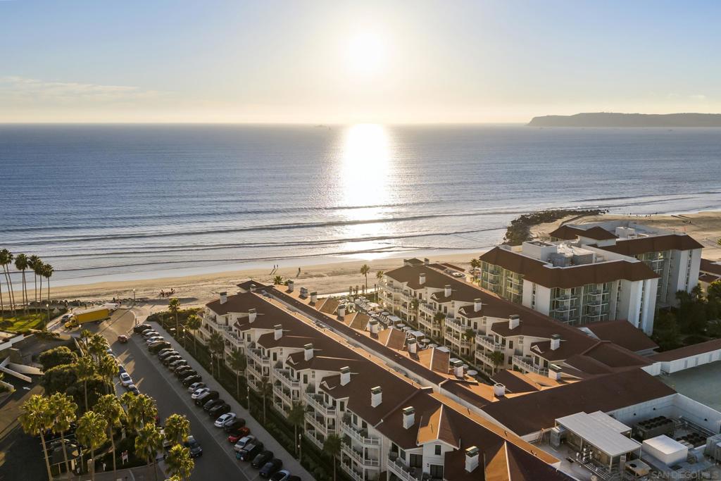 Experience refined coastal living at Shore House at The Del, where timeless elegance meets modern design along Coronado’s iconic shoreline. This beautifully appointed 2-bedroom, 2-bath residence features an open-concept floor plan filled with natural light and showcases unobstructed views of the Pacific Ocean and Glorietta Bay. The thoughtfully designed kitchen offers quality finishes and modern appliances, ideal for everyday living and casual entertaining. Floor-to-ceiling windows in the spacious living area frame breathtaking coastal views, creating a seamless indoor-outdoor connection. Step onto the oversized balcony to enjoy the ocean breeze—perfect for morning coffee or evening relaxation. As an owner, you’ll enjoy access to world-class amenities at The Del, including a five-star spa, state-of-the-art fitness center, and award-winning dining—all just steps away. This is full ownership with limited personal use and strong rental income potential. Don’t miss this rare opportunity to own a piece of Coronado’s most luxurious coastal offering. Experience refined coastal living at Shore House at The Del, where timeless elegance meets modern design along Coronado’s iconic shoreline. This beautifully appointed 2-bedroom, 2-bath residence features an open-concept floor plan filled with natural light and showcases unobstructed views of the Pacific Ocean and Glorietta Bay. The thoughtfully designed kitchen offers quality finishes and modern appliances, ideal for everyday living and casual entertaining. Floor-to-ceiling windows in the spacious living area frame breathtaking coastal views, creating a seamless indoor-outdoor connection. Step onto the oversized balcony to enjoy the ocean breeze—perfect for morning coffee or evening relaxation. As an owner, you’ll enjoy access to world-class amenities at The Del, including a five-star spa, state-of-the-art fitness center, and award-winning dining—all just steps away. This is full ownership with limited personal use and strong rental income potential. Don’t miss this rare opportunity to own a piece of Coronado’s most luxurious coastal offering.