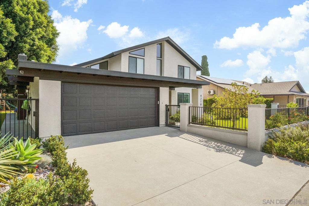 Beautifully updated and ideally located, this two-story solar-equipped home sits in one of University City’s most sought-after neighborhoods. Just minutes from Curie Elementary, Standley Middle, University City High, UCSD, and the UTC shopping and dining hub, the home offers both convenience and charm. Step inside to find warm wood flooring, fresh paint, and an open, light-filled layout that flows from the kitchen through to the living room and out to a sunny, inviting backyard. The kitchen has been thoughtfully remodeled with quartz countertops, new cabinetry, and quality appliances. Just off the dining area, a cozy family room and a set of bedrooms with a full bath offer flexible living options. Upstairs, you’ll find a generously sized primary suite with a walk-in closet and updated bath, plus two more bedrooms, another full bathroom, and a spacious bonus room that can serve as a fifth bedroom, office, or playroom. The backyard features a large patio perfect for entertaining or gardening. Across the street, you'll find shopping and daily conveniences, while Standley Park is less than a mile away, offering a public recreation center with a gymnasium, meeting rooms, kitchen, sports fields, basketball and tennis courts, racquetball courts, picnic areas, and tot lots—plus direct access to Swanson Pool.