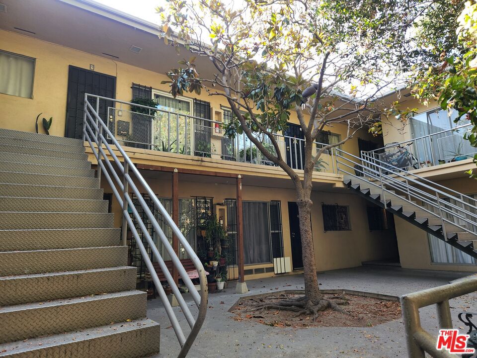 Second floor unit. Very spacious 2 Bedrooms / 2 baths, lots of closet space, large living room, dining area. Centrally located near freeways, metros, shopping etc. Parking available, freshly painted with stove & refrigerator. Balcony overlooking court yard. Restricted entrance. Trash, hot & cold water included. See private remarks for showings.