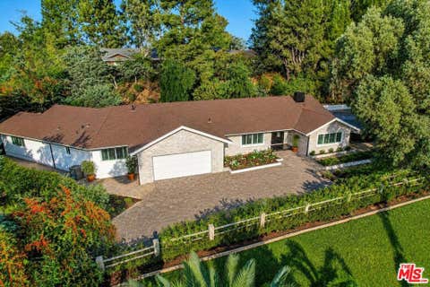 Photo of 4732 Del Moreno Drive, Woodland Hills, CA 91364 (MLS # 26835339)