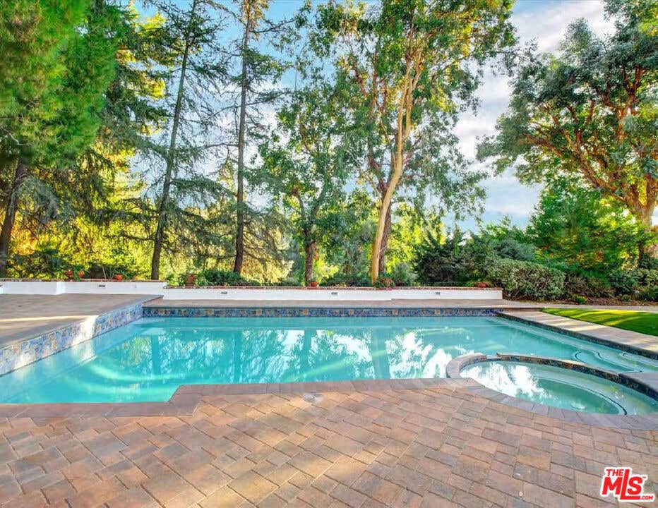 Photo of 4732 Del Moreno Drive, Woodland Hills, CA 91364 (MLS # 26835339)