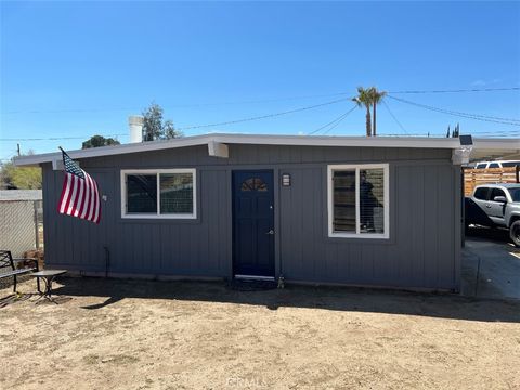 Photo of 16593 Forrest Ave, Victorville, CA 92395 (MLS # DW25241999)