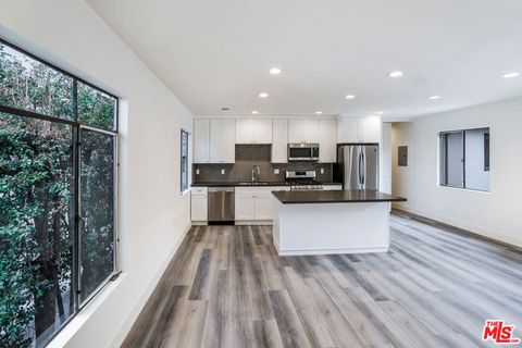 Photo of 11725 Darlington Avenue #8, Los Angeles, CA 90049 (MLS # 26648935)