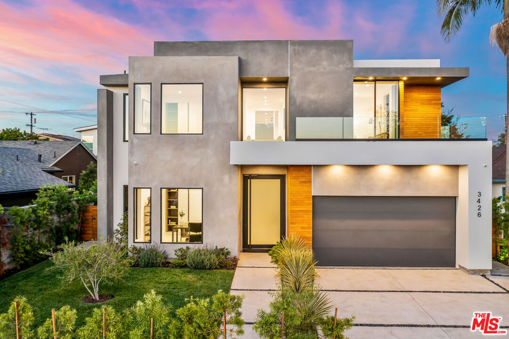 Polished & sophisticated, this 2021-built contemporary Mar Vista home is the definition of luxury. From its location offering year-round coastal breezes & sunset views atop a coveted street to its profound attention to detail designer finishes from leading luxury brands, this 5 bed, 5.5 bath home sets a new bar for modern Mar Vista living. With ~3,938 sqft of entertaining space, the in/outdoor paradise features an open living room, dining room & gourmet kitchen fully equipped w/ stainless Thermador appliances throughout. Dual vanishing doors reveal a resort-like backyard w/ pool and spa. Downstairs guest suite doubles as a home office. Upstairs includes Oversized Master with high ceilings, walk-in closet, and 3 other bedrooms. The backyard has an expansive grass area perfect for alfresco dining and summer entertaining. This sun-drenched, "California Beauty" is a must-see.