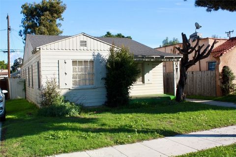 Photo of 5924 Lewis Avenue, Long Beach, CA 90805 (MLS # PW26003640)