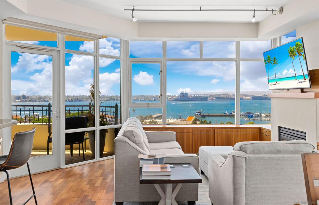 Elevate your lifestyle in this highly sought-after Southwest corner residence at Park Place, offering unforgettable bay and city lights views from every room and two private terraces. This coveted floor plan features 2 bedrooms plus a den/office, with seamless indoor-outdoor living and refreshing cross breezes throughout. You will love the custom built in cabinetry thought the residence. Enjoy panoramic vistas that span the San Diego Bay, marina, Coronado Island, Coronado Bridge, and the sparkling city skyline—a rare opportunity to own one of downtown’s premier view homes. This turn key residence comes fully furnished at no additional cost and includes two parking spaces and a storage cage. Park Place is one of downtown San Diego’s most prestigious full-service luxury high-rises, with amenities including 24/7 front desk staff, guest parking, a resort-style pool and spa, fitness center, BBQ courtyard with lounge seating, and an elegant entertainment room. Perfectly positioned at the southwest corner of downtown, Park Place places you just steps from Seaport Village, the Gaslamp Quarter, Little Italy, and the waterfront—with endless dining, shopping, and cultural experiences at your doorstep. This is downtown living at its finest—luxury, convenience, and iconic San Diego views.