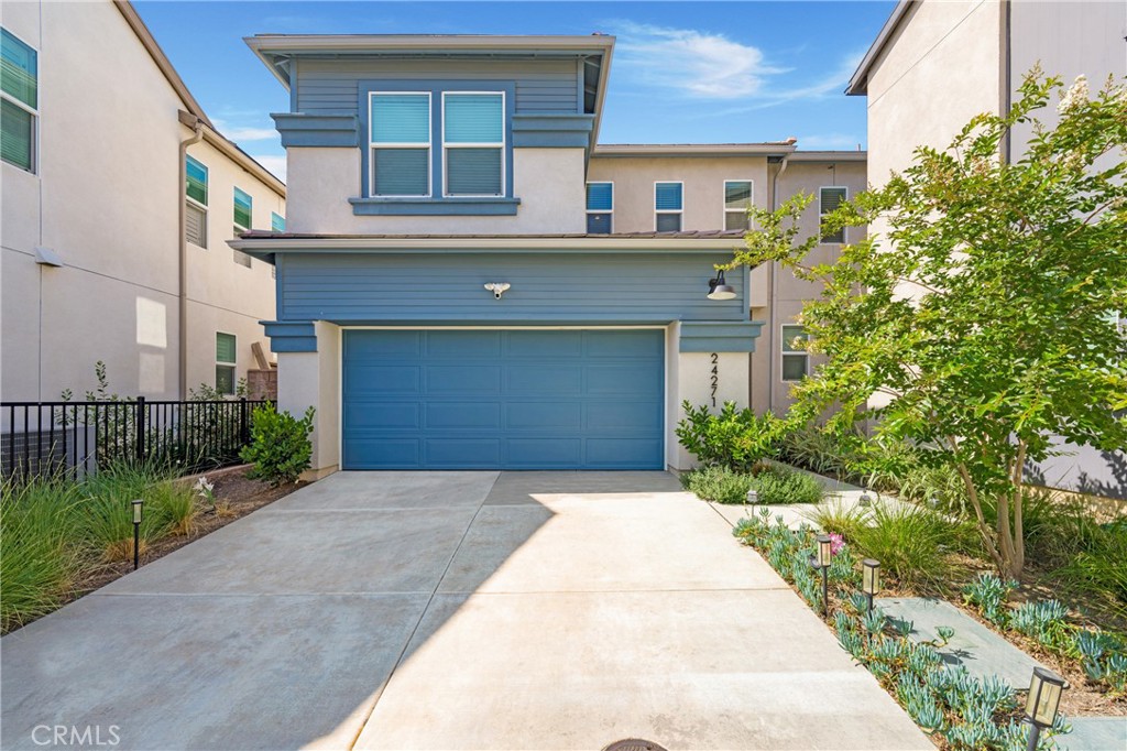 Beautiful solar-powered home in the brand-new Serrano community of Corona. Plan 2 offers an open concept living, dining, and kitchen layout. The spacious kitchen is open to the large living area. Outside is your lovely finished backyard – the perfect place to enjoy the beautiful California weather. A downstairs guest bedroom and full bathroom round out the main level. Upstairs is the Primary Suite with a large walk-in closet and spacious shower and soaking tub in the bathroom. Also located on the second floor is a roomy loft area, two secondary bedrooms and another full bath, and laundry room. Home amenities include an attached two-car garage, wood laminate flooring, water softener, solar that provides lower electric bills, ceiling fans in all rooms, security cameras that can be transferred into the tenant's name, and quartz countertops. If the tenant would like, the backyard furniture, grill, and firepit can be left. Housing provider will pay for trash and security monitoring. The property includes leased solar, refrigerator, and washer/dryer. Serrano is about to open the brand-new community pool, has trails and parks, and is conveniently near schools, shopping, restaurants, and freeway access.