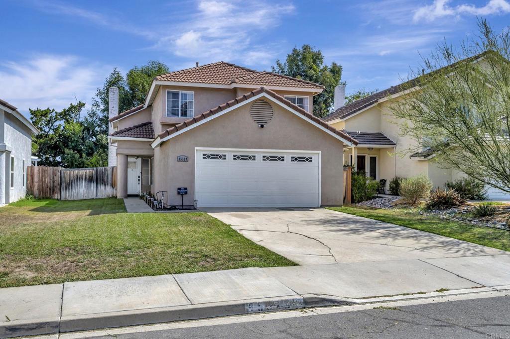Charming move in ready home with prime Temecula location. Easy access to freeway. French door off living room leads you to your private and mature back yard. Kitchen boasts newer appliances and tile counter tops. Complete with 3 bedrooms upstairs. Don't let this home pass you by!