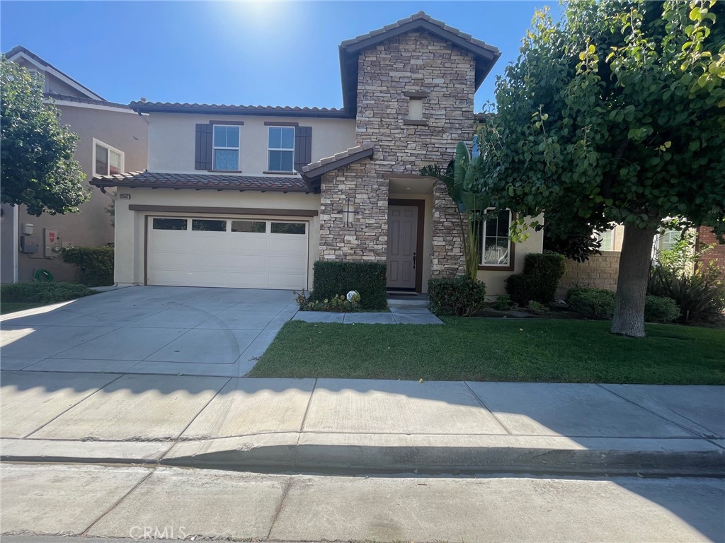 This cozy single-family home has lots of upgraded features with 3 bedrooms, 2.5 bathrooms, and a spacious loft upstairs. Entrance with custom tiles, Engineer wood floor throughout downstairs. Formal living room with high ceiling opens to loft upstairs. The family room comes with fire place. Granite countertop in the kitchen with island and breakfast bar. The breakfast area is next to the kitchen, with a sliding door to the backyard. Spacious master bedroom with walk-in closet full of custom designed shelves and drawers. The upstairs loft gives you and your family bonus space for entertainment or other multiple usages. Individual laundry room upstairs. Great location! Walking distance to the community parks. Convenience to the shops and easy access to the freeway.