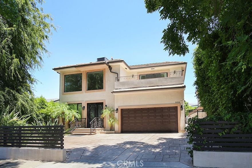 Experience luxury living in this beautifully designed 5-bedroom, 4.5-bathroom residence, ideally situated in a prestigious neighborhood South of the Boulevard. Recently freshly painted, this spacious home features an open-concept floor plan with soaring 10-foot ceilings and an abundance of natural light that enhances the elegant interior.

The chef’s kitchen is a true showstopper, featuring a large center island, exquisite marble countertops, and top-of-the-line Thermador stainless steel appliances, Rich hardwood floors flow seamlessly throughout the home, adding warmth and sophistication to every room. The expansive primary suite offers a serene retreat with a generous walk-in closet, dual vanities, a freestanding soaking tub, and a separate glass-enclosed shower. Each of the additional bedrooms also includes its own walk-in closet, ensuring both comfort and ample storage. Enjoy scenic views from two private balconies, or step outside to a beautifully landscaped backyard oasis complete with a sparkling pool, jacuzzi, and plenty of space to relax or entertain in style. Conveniently located near top-rated schools, popular restaurants, and premier shopping destinations, this exceptional home offers the perfect blend of luxury, comfort, and convenience.