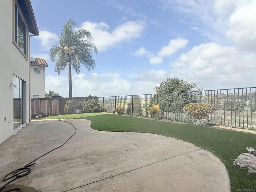 Welcome to this stunning 5-bedroom, 3-bathroom home with a 2-car attached garage, located in the highly desirable gated community of Mar Brisa, one of the most exclusive enclaves in coastal Carlsbad. Enjoy breathtaking 180–270-degree views of the golf course and surrounding mountains, visible from the backyard, kitchen, family room, living room, and primary bedroom. This home features Bright white kitchen cabinetry with stone quartz countertops both in kitchen and all bathrooms. High ceilings for an open, airy feel. Solar panels + EV charger for energy efficiency and minimum electricity, artificial turf in the backyard for low maintenance, and minimum water bills. Mar Brisa offers residents private gated access, community pool, walking trails, and resort-style amenities. Just minutes away from world-class beaches, Aviara Golf Club, Legoland, Costco, Premium outlets, dining more. Don't miss the opportunity to experience the luxury, privacy, and natural beauty of Mar Brisa, where sweeping mountain vistas and refreshing ocean breezes define life on this coastal hilltop.