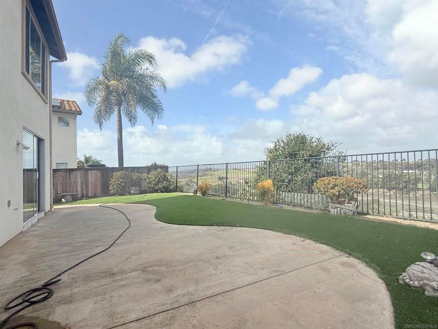 Welcome to this stunning 5-bedroom, 3-bathroom home with a 2-car attached garage, located in the highly desirable gated community of Mar Brisa, one of the most exclusive enclaves in coastal Carlsbad. Enjoy breathtaking 180–270-degree views of the golf course and surrounding mountains, visible from the backyard, kitchen, family room, living room, and primary bedroom.  This home features Bright white kitchen cabinetry with stone quartz countertops both in kitchen and all bathrooms. High ceilings for an open, airy feel. Solar panels + EV charger for energy efficiency and minimum electricity, artificial turf in the backyard for low maintenance, and minimum water bills.  Mar Brisa offers residents private gated access, community pool, walking trails, and resort-style amenities. Just minutes away from world-class beaches, Aviara Golf Club, Legoland, Costco, Premium outlets, dining more.   Don't miss the opportunity to experience the luxury, privacy, and natural beauty of Mar Brisa, where sweeping mountain vistas and refreshing ocean breezes define life on this coastal hilltop.