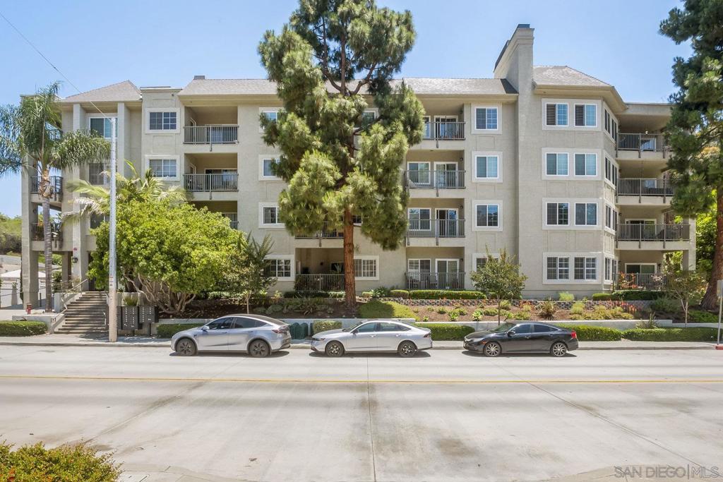 This gorgeous condo is located in the highly desirable, upscale Coventry Woods complex in the heart of North Park. Enter through the beautiful Craftsman-like lobby door to the sophisticated and welcoming lobby. This “feels like a home” condo features great space with modern ceiling height, a gracious living room with soft, lit built-in shelving, a handsome fireplace with mantle, and perfectly set indirect lighting. The well-planned open kitchen features brand-new, gleaming stainless steel GE appliances. A side-by-side washer and dryer, also newer, are located in a full-size laundry room with storage cabinets. The wrap-around patio is accessed by sliders in the living and master bedrooms, and the view from the balcony is of lush, natural greenery as far as the eye can see. Just minutes away from Morley Field, Balboa Park, San Diego Zoo, Naval Hospital, Shops, Restaurants, and downtown San Diego. Be sure to check out the rooftop deck for lounging, entertaining, and BBQs. The unique property also includes two assigned garage parking spaces. Coventry Woods happens to be one of the nicest complexes in North Park!