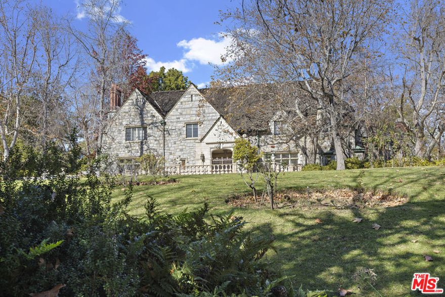 A Timeless Tudor revival estate set back on famed Sunset Blvd in prime Beverly Hills. Offering over 200 feet of frontage with a private entrance on Mountain Drive. This is rare opportunity to own a distinguished estate that is ready to be elevated to the next level.