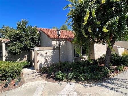 Photo of 102 Tangerine, Irvine, CA 92618 (MLS # OC26120687)
