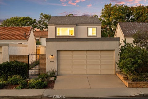 Photo of 94 Sequoia Tree Lane, Irvine, CA 92612 (MLS # OC26210650)