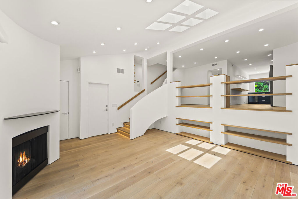 Stunning Architecturally Remodeled 3 bedroom / 3 bath Townhome with an expansive private patio offers an amazing opportunity to live in the beach community of Marina Del Rey. This sophisticated home has been thoughtfully redesigned and beautifully appointed with luxury finishes and modern upgrades throughout. Step inside to beautiful white oak flooring that adds contrast and elegance throughout. The designer kitchen is a showstopper, featuring black stainless appliances, a wine fridge, expansive new cabinetry, open shelving. Dramatic designer lighting adds warmth and elegance, enhancing the contemporary aesthetic. Each bedroom is en-suite with its own bath, with the primary suite boasting a large soaking tub and separate glass-enclosed shower. No details have been spared, including a fully finished garage with premium storage. Nestled within lush landscaping in one of the most desirable gated communities in the Marina, this home is surrounded by mature greenery and enjoys access to resort-style amenities. The unbeatable location puts you close to shopping, dining, and the best of coastal living.