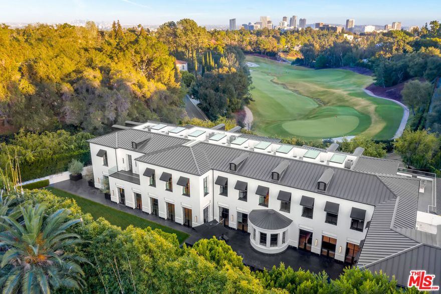 TEN701 Bellagio Road: A warm contemporary French Manor set in the heart of Old Bel-Air. Private and gated compound perched above the sixth hole fairway of the world's most exclusive country club with views spanning the Bel Air greenbelt to the iconic LA skyline and beyond. A new generation of home with trademark elegant lines- Striking richness with brand new chevron wood flooring throughout (elegance, not flash) and beautifully portioned spaces abound. Offering 8 grand Bedroom suites, 12 Bathrooms, staff quarters, and guest house. World-class movie theatre, wellness center, Grand Ballroom, an exquisite black marble bar with seamlessly integrated indoor and outdoor entertaining spaces. Rolling lawns of green, parking for 30+ cars with auto gallery. Seller is motivated to find buyer- offers from qualified clients with be reviewed as they come in. World Class Trophy Property- Do not miss this opportunity.