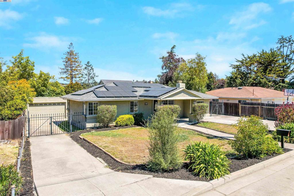 Welcome to 17526 Parker Rd – A Hidden Gem in a Prime Castro Valley Location! This beautifully updated home offers 4 spacious bedrooms, 2 full bathrooms, and 1,788 sq ft of thoughtfully designed living space. From the moment you step inside, you’ll love the open-concept floor plan, ideal for both relaxing and entertaining. The light-filled living areas flow seamlessly into a beautiful kitchen featuring modern finishes and ample storage. Enjoy California living at its best in the serene backyard, complete with a brand-new deck—perfect for summer gatherings or peaceful mornings with a cup of coffee. The large detached garage includes a workshop and extensive storage space, plus there’s ample off-street parking with convenient side access for boats, trailers, or RVs. This home also includes a paid solar system for energy efficiency, central AC for year-round comfort, and fresh interior paint throughout. Located close to Parsons Park, Lake Chabot, scenic hiking and biking trails, and vibrant downtown Castro Valley. To top it off, this home is served by award-winning Castro Valley schools.