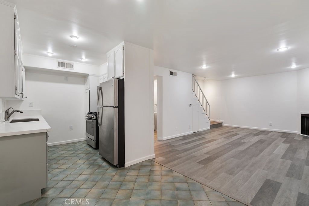 Photo of 1434 S Point View St, Los Angeles, CA 90035 (MLS # OC26024637)